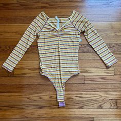 Third Picture Is True Color, Listed As “Sunset Combo”. Very Soft Striped Bodysuit With Button Snap Closure. 53% Rayon, 40% Polyester And 7% Spandex. Yellow Cotton Bodysuit For Summer, Casual Yellow Bodysuit For Beach, Casual Yellow Bodysuit For The Beach, Fitted Yellow Casual Bodysuit, Fitted Yellow Bodysuit Casual Style, Casual Fitted Yellow Bodysuit, Casual Yellow Long Sleeve Bodysuit, Trendy Yellow Stretch Bodysuit, Yellow Casual Bodysuit For Spring