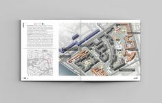 an open book showing the layout of a building and its surrounding area, with information about it