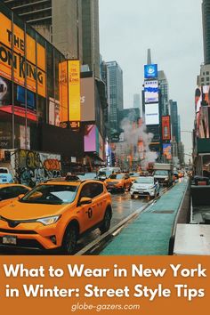 a city street filled with lots of traffic and tall buildings in new york, ny