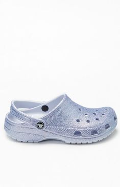 Crocs will keep you comfy this season in their Kids Glitter Classic Clogs. These slip-on shoes have an incredibly light construction and a pivoting heel strap for a secure fit.All-over glitter finishPivoting heel strapLight constructionVentilation holesIconic Crocs Comfort™ Crocs Kids Glitter Classic Clogs - Multicolor size 3 Kids Glitter Crocs, Kids Crocs, 5 Kids, 3 Kids, 4 Kids, Trending Gifts, Christmas Wishes, Strap Heels, Christmas List