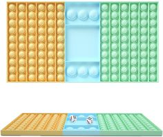 two different colored blocks with dices on them and one in the middle is empty