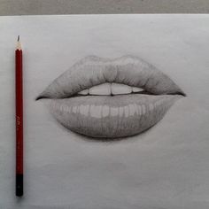 a pencil drawing of a woman's mouth and lips on paper with a red pencil