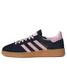 The adidas Handball Spezial Core Black Clear Pink Gum is a retro-inspired sneaker with a modern twist. Featuring a soft suede upper in black, the shoe is accented with clear pink details on the 3-Stripes, laces, and lining. A gum rubber outsole provides durable traction, while the classic toe overlay and serrated 3-Stripes add a touch of heritage style. Adidas Samba Womens, Preppy Pink Shoes, Black And Pink Adidas, Navy And Pink Adidas, Addidas Shoes Outfits Summer, Pink Aesthetic Shoes, Black And Pink Sambas, Sneakers Pink, Black And Pink Shoes