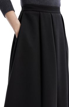 Pleats of different widths create beautiful movement on this voluminous wool-kissed skirt cut to a dramatic maxi length. Hidden side-zip closure 79% polyester, 19% wool, 2% polyurethane Dry clean Imported Asymmetrical Pleated Maxi Skirt For Evening, Formal A-line Maxi Skirt With Pleated Waist, Voluminous Asymmetrical Maxi Skirt For Evening, Voluminous A-line Skirt For Evening, Formal Pleated Midi Maxi Skirt, Formal Midi Pleated Maxi Skirt, Evening Skirt With Pleated Waist Midi Length, Evening Midi Skirt With Pleated Waist, Evening Asymmetrical Gathered Maxi Skirt