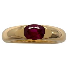 Vintage Cartier Vivid Red Ruby 18k Yellow Gold Solitaire Band Ring. Stunning yellow gold ring set with a vivid red ruby. Fine jewellery houses like Cartier only use the finest of gemstones and this ruby is no exception. An excellent quality ruby with fine colour and an excellent oval cut. Measures 6x4mm approx. 0.60 carat. The ruby has some small natural inclusions but still a clean stone. The ring is signed Cartier 750 with serial numbers and a French eagle hallmark. Ring size UK M - US 6 - EU 52 - Some resizing is possible. Please message us with any sizing requirements before purchasing. This has been professionally polished and cleaned to excellent condition. Very bright and shiny. Ring weighs 9.6g. A heavy and well made piece. Comes with original Cartier ring box. All our photos are t Ruby Ring Vintage, Yellow Gold Solitaire Ring, Solitaire Bands, Yellow Gold Solitaire, Gold Solitaire Ring, Gold Ring Sets, Red Ruby, Cartier Ring, Yellow Gold Ring