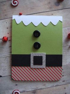 a close up of a card with buttons on it