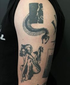 a man's arm with tattoos on it, including an image of a woman