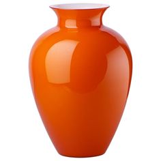 an orange vase is shown on a white background