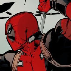 the deadpool character is wearing a red mask and holding a knife in his right hand