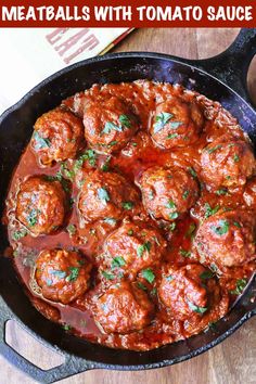 meatballs with tomato sauce in a cast iron skillet on a wooden table and text overlay