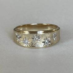 an image of a wedding band with flowers on it