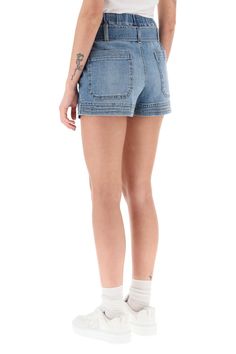 Stella McCartney shorts crafted in Vintage Mid Blue wash stretch cotton denim with contrasting stitching. High-rise elastic waist with loops and self-tie denim belt. Side welt pockets and rear patch pockets. The model is 177 cm tall and wears a size 26. Size Info JEANS Color Detail Light blue Made In Italia Material 98% CO*** 2% EA Season One spring Season Two summer Product clothing Brand Stella McCartney Size And Fit Contrasting Stitching, Denim Belt, Vegan Clothing, Short En Jean, Jeans Jumpsuit, Jeans Color, Chic Woman, Yoga Wear, Welt Pockets