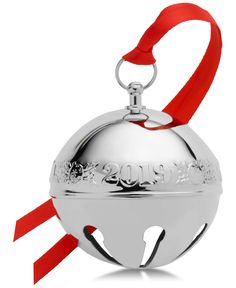 a silver bell ornament with a red ribbon around it and the word 2009 on it