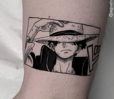 a man with a hat on his head is shown in black and white tattoo art