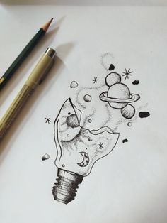 a pencil drawing of a light bulb with planets around it