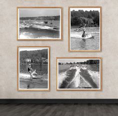 four black and white photos hang on the wall above a wooden floor in an empty room