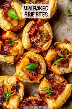 mini baked brie bites with herbs on top and the title overlay reads, mini baked brie bites