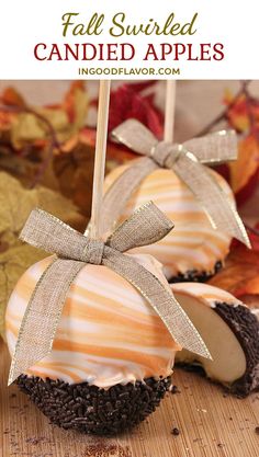 two caramel apples are sitting on a table with fall leaves in the background and text overlay that reads, fall stuffed candies