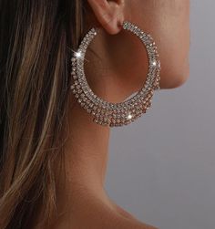 These women exaggerated rhinestone tassel big hoop earrings are a show stopper! Perfect for date night or the holidays. Pair it with your favorite dress, leather look or tank for a star studded look. Description: Color: Gold Gender: Women Material: Glass Earring Studs Materials: Stainless Steel Measurements in inches: Size Eardrop Height Eardrop Width one-size 2.9 3 Diamond Hoop Earrings Large, Rhinestone Hoop Earrings, Fashion Geometric, Bling Earrings, Big Hoop Earrings, Big Diamond, Earrings Large, Big Earrings, Gold Rhinestone