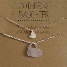 two necklaces that say, mother and daughter