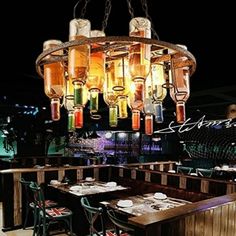 a chandelier hanging from the ceiling in a restaurant