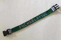 a green watch strap with the words pixel on it