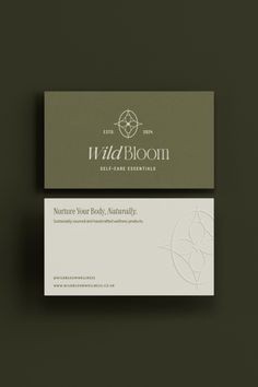 the business card is designed to look like it has an elegant logo