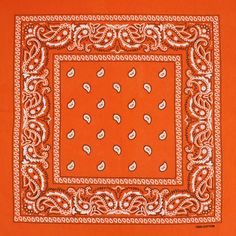 an orange bandanna with white paisleys and hearts on the center, is shown