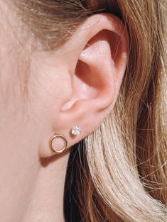 Need a sleek stud for your stack? The Sol Stud Earrings are the perfect way to add simplicity and style to your look. The studs are a circular, open geometric shape and create a gorgeous, unique style for your first or second piercing. Materials: 14k Gold Fill, 14k Rose Gold Fill, Sterling Silver Measurements: .25" Modern 14k Gold Internally Threaded Earrings, Everyday 14k Gold Round Piercings, Minimalist Internally Threaded Round Piercings, Everyday Round 14k Gold Piercings, Minimalist 14k Gold Piercings For Anniversary, Minimalist 14k Gold Internally Threaded Cartilage Earrings, Minimalist Pierced Open Circle Jewelry, Minimalist Rose Gold Circle Earrings, Minimalist Round White Gold Piercings