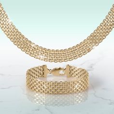 This collection will elevate any ensemble to new heights of elegance. Finished in yellow gold, each piece in this set showcases the unparalleled artistry and craftsmanship of Italian jewelry makers. The stunning Bismark link chain is renowned for its intricate design. Its interwoven links create a mesmerising tapestry of light and shadow. Pair the necklace with the matching bracelet, completing the set with an air of harmony and grace. Delicate yet striking, it adorns the wrist with effortless e Classic Gold Jewelry Sets With Diamond Cut, Luxury Gold Diamond-cut Jewelry Sets, Luxury Gold Jewelry Sets Diamond Cut, New Catalogue, Italian Jewelry, Matching Bracelet, Latest Jewellery, Matching Bracelets, Jewelry Maker