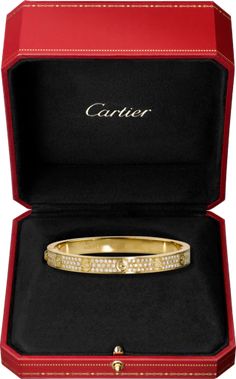 Love bracelet, 18K yellow gold, set with 204 brilliant-cut diamonds totaling 1.99 carats. Width: 6.7mm. ABOUT THE COLLECTION A child of 1970s New York, the LOVE collection remains today an iconic symbol of love that transgresses convention. The screw motifs, ideal oval shape and undeniable elegance establish the piece as a timeless tribute to passionate romance. Studded with diamonds, yellow gold or rose gold: how far would you go for love? Cartier Love Bracelet Diamond, Bracelet Diamond, Mens Gold Jewelry, Bracelet Love, Cartier Jewelry, Love Bracelet, Yellow Gold Jewelry, Cartier Love, Bracelet Collection