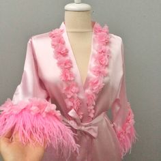 "❤️ The bride robe with feather is made of high quality silky satin. Natural boa feathers. Our exclusive long silky bridal gown will look great at photo shoots. Robe is perfect for bachelorette party, wedding and wedding morning, photo wedding ️💍  * Supplied in a beautiful gift box. * Fastened with a belt. * Length 90 cm/36 inches * Handmade * Made in Turkey * 100%satin * Length (36\")90 cm Optional personalized name put on the back side crystal stone  To make the feathers more fluffy, they need to be ironed with steam and left to hang for 2 days. Bride robe with feather, White boudoir robe, Long silky robe, Bridal lace robe, Bridesmaid robes, Bridesmaid gift, Feather Bridal Robe" Personalized Bride Robe, Bridal Dressing Gown, Bride Slippers, Baby Robes, Morning Photo, Silky Robe, Wedding Morning, Bridal Robe, Personalized Bride