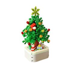 a lego christmas tree on top of a computer