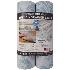 two rolls of blue and white paper with the words, shel - e & drawer liner