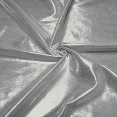 the fabric is shiny and silver in color