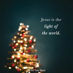 a lit christmas tree with the words jesus is the light of the world