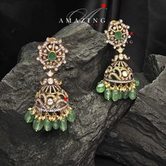 Silver Moissanite Polki Hydro Emerald Tumble Jhumka, Polki Kundan Earring, Indian Wedding Jewelery, Silver Polki Jhumki, Big Jhumka, Earring Material : Silver Gemstone: Moissanite, Hydro Emerald Tumble , Swarovski Stones Stone colour: Uncut Polki Primary colour: Gold Size-Length: 55mm Width: 25mm Closure : Screw back and Clips Silver Intricate, hand crafted, Pure Silver Polki Earrings, studded with high quality Moissanite Polki Earring comes with screw back and clips, made in 92.5 silver with 22 Hand Set Jhumkas For Diwali Reception, Silver Jhumkas With Latkans For Reception, Green Hand Set Fusion Jhumkas, Silver Jhumkas For Reception With Latkans, Traditional Hand Set Diamond Earrings, Traditional Diamond Earrings With Intricate Design, Hand-set Jhumkas For Reception And Festivals, Intricate Design Jhumkas For Reception, Hand Set Jhumkas For Reception And Festivals