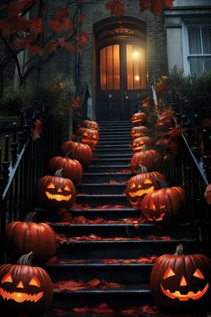 halloween pumpkins on the steps in front of a house