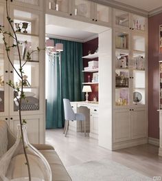 a living room filled with lots of furniture and walls covered in bookshelf's