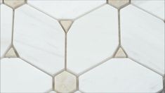 white marble hexagonal tiles with grey edges