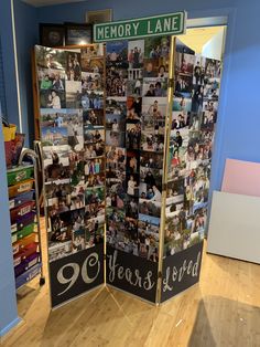 a display case with photos and words on it in a room that has blue walls