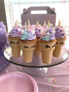 an image of cupcakes with unicorn toppings on them