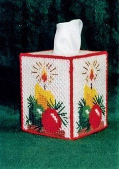 a tissue box with christmas decorations on it