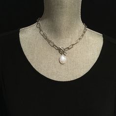 "❤️❤️❤️ On Sale 20% off and Free Shipping ❤️❤️❤️ Chunky silver paperclip chain with a decorative toggle clasp and Moonstone pendant. Made to order from 14-38 inches. Please verify length before ordering and refer to the guidelines below. 14-20 inches for single strand 18-30 inches for longer necklace 30-38 inches for a double choker Please measure and verify neck or size before ordering tight pieces like a 14\" choker. Moonstone is an oval shaped 16x20mm stone bezel set in sterling silver. It ha Elegant Silver Toggle Necklace For Gift, Silver Toggle Necklace With Pearl Pendant As Gift, Elegant Toggle Necklace With Silver Chain As Gift, Elegant Silver Toggle Necklace With Oval Link, Elegant Silver Necklace With Toggle Clasp, Elegant Silver Oval Link Toggle Necklace, Elegant Silver Toggle Necklace, Silver Toggle Necklace With Pearl Chain As Gift, Elegant Silver Toggle Necklace With Chunky Chain