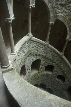 the inside of an old stone building with columns