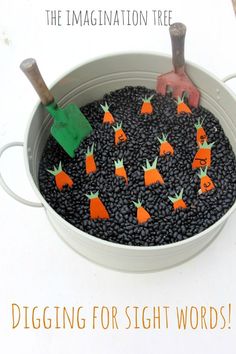 there are carrots that have been placed in the pot with some dirt on them