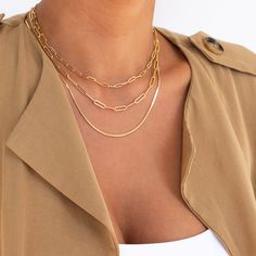 "14 Karat gold filled fine plain delicate chain necklace. Perfect for layering or on its own. Matching bracelet is available: https://www.etsy.com/listing/690487349/gold-bracelet-14-karat-gold-filled?ref=shop_home_active_22&frs=1 ------------------------------- M A T E R I A L S * A N D * S I Z I N G 14 Karat Gold Filled Chain 3mm x 8.5mm 14 Karat Gold Filled Chain 3.7mm x 12mm 14 Karat Gold Filled Components -------------------------------- W H A T * I S * G O L D * F I L L E D * G O L D * Trendy Gold Paperclip Necklace, Minimalist Clavicle Chain Necklace With Rectangular Links, Gold Paperclip Clavicle Chain Necklace, Trendy Gold-tone Link Necklace, Chic Gold Chain Charm Necklace, Trendy Clavicle Chain Layered Necklace, Trendy Everyday Clavicle Chain Layered Necklace, Trendy Gold Charm Necklace With Chunky Chain, Gold Plated Clavicle Chain Necklace