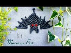 a close up of a piece of cloth with leaves on it and the words diy macrame bat