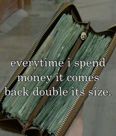 someone holding a wallet full of money with the caption, every time i spend money it comes back double its size