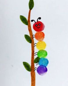 a child's drawing of a caterpillar on a tree branch